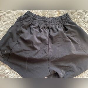 Black size 8 4” lululemon hotty hot shorts